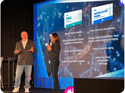 Mark Bennett and Kelly Chauvin presenting on stage